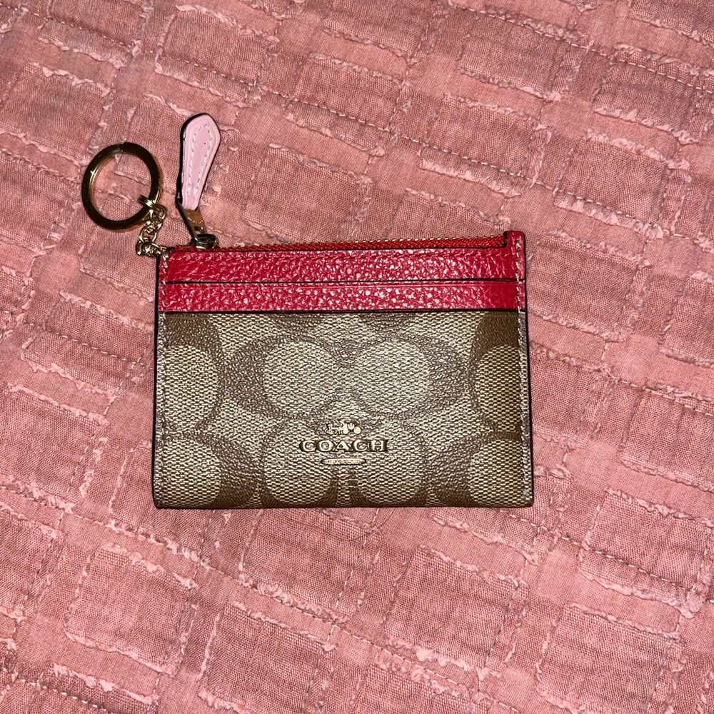 Coach card holder. Brown red pink
